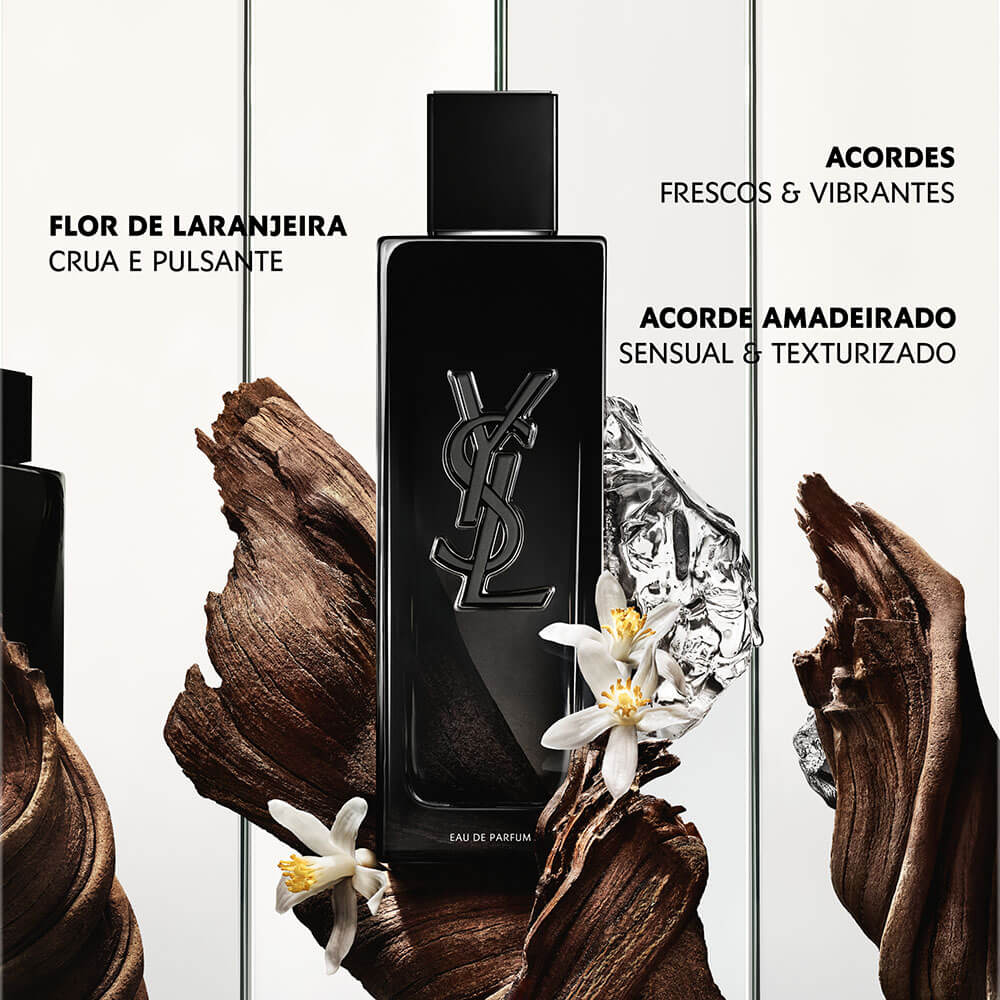Composição oficial YSL MYSFL mostrando matérias-primas: frasco preto entre flor de laranjeira fresca, raspas de madeira (patchouli) e cristal âmbar, com legendas 'Acordes Frescos & Vibrantes', 'Flor de Laranjeira Crua e Pulsante' e 'Acorde Amadeirado Sensual & Texturizado'.